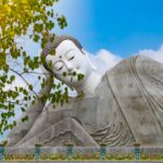 white concrete statue under blue sky during daytime