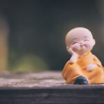 baby in yellow shirt figurine